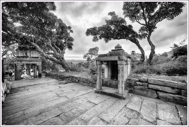 Climbing the Yoganarasimha Temple at Melkote