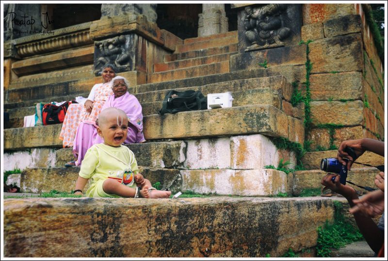 A child weeps as his photo is taken